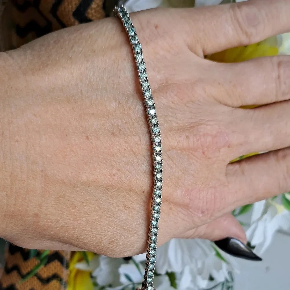 Genuine Blue Moissanite Tennis Bracelet In 925 Sterling Silver.
